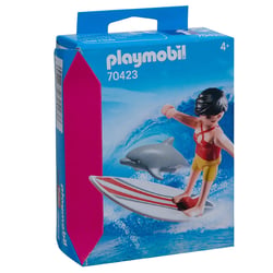 Surfeuse avec un dauphin