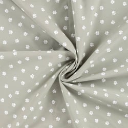 Tissu Popeline de Coton  patounes blanches  Zumi sur fond Vert kaki clair - Au mètre