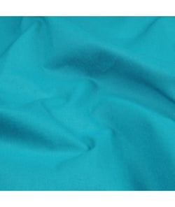 Tissu uni 100 % coton de 150 cm de largeur UNI JADE vendu par 50 cm