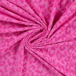 Tissu Maille motif léopard éponge sur fond Rose fuchsia