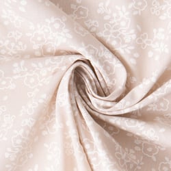 Tissu Coton imprimé floral Obia blanc sur fond Beige sable