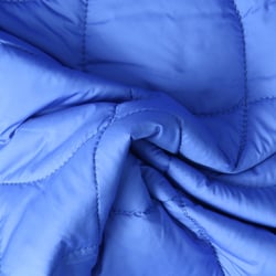 Tissu Doudoune matelassé Nils uni Bleu roi envers Vert anis