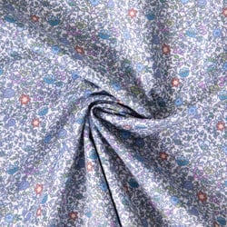 Tissu Batiste de Coton Charlie tapis fleuri sur fond Bleu lilas
