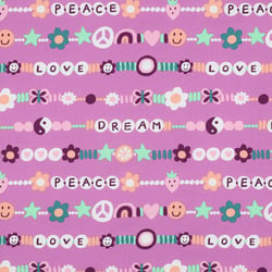 Tissu popeline de Coton  Peace sur fond Violet - Au mètre
