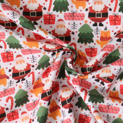 Tissu Coton imprimé  Néola pères Noël Rouges sur fond Blanc - Au mètre