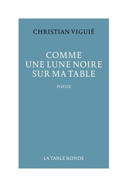 Comme une lune noire sur ma table