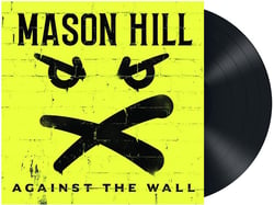 Against the wall