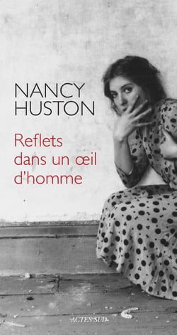 REFLETS DANS UN OEIL D'HOMME
