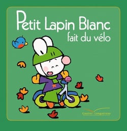 Petit lapin blanc - fait du vélo