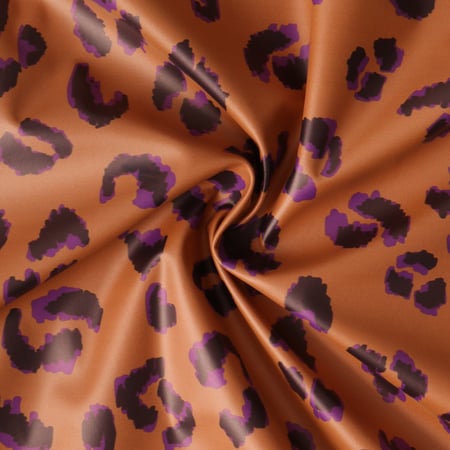 Tissu Imperméable Savannah Pop léopard Violet sur fond Terracotta - Au mètre
