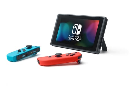 Nintendo Switch + paire de Joy-Con rouge néon et bleu néon