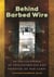Behind Barbed Wire - An Encyclopedia of Concentration and Prisoner-of-War Camps