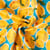 Tissu Viscose imprimé Limoncello pluie de citron sur fond Bleu turquoise