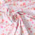 Tissu Jersey stretch fleurs Delya sur fond Blanc