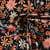 Tissu Jersey stretch fleurs Eboni sur fond Noir