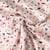 Tissu Popeline de Coton  Petits Fantômes sur fond Rose nude - Au mètre