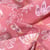 Tissu Coton imprimé Sala sur fond Rose - Au mètre