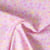Tissu Popeline de Coton légère floral pastel rose, jaune pastel et vert clair sur fond Mauve clair