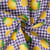Tissu Coton imprimé Carreaux violet et citrons, oranges jaunes sur fond Blanc
