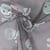 Tissu Tulle souple  Morgana tête de mort paillettes argentés et irisés sur fond Noir - Au mètre