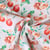 Tissu Coton imprimé Nélya décorations de Noël Rouges sur fond Blanc - Au mètre