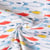 Tissu Coton Sergé d'ameublement Sardinades rouge jaune bleu sur fond Blanc