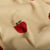 Tissu Velours milleraies Léontine pommes Rouges sur fond Beige sable