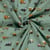 Tissu Double gaze de Coton Léo engins chantier sur fond Vert amande