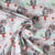 Tissu Coton imprimé Perroquet flower sur fond Vert menthe