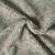Tissu Fausse fourrure Mouton Toundra moucheté Rose et Vert sur fond Vert d'eau