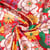 Tissu Imperméable déperlant Belonia Fleurs Belone sur fond Rouge