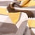 Tissu Toile Coton aspect lin Rayures jaunes sur fond Gris
