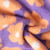 Tissu Sherpa Elya  Fleurs Oranges sur fond Violet