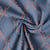 Tissu Jacquard Ondes Texturées Orange sur fond Bleu denim