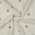 Tissu Bouclettes Cerises brodées sur fond Ecru
