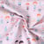 Tissu Coton imprimé  Poupinella sur fond Rose poudré - Au mètre