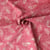 Tissu Coton imprimé Batik Lianys sur fond Rose - Au mètre