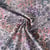 Tissu Popeline de Coton Amandine fleurs Violettes sur fond Ecru