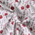 Tissu Coton imprimé Ysaline décorations de Noël Rouges sur fond Blanc - Au mètre