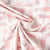 Tissu Coton imprimé Marie sardines Rose pastel sur fond Ecru