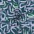 Tissu Viscose imprimé motifs abstraits Lila et Vert d'eau sur fond Vert canard