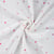 Tissu Double gaze de Coton Petites coeurs roses et parmes sur fond Blanc