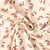 Tissu Jersey Coton imprimé Lya petites fleurs Vieux Rose sur fond Crème
