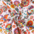 Tissu Popeline de Coton  Paréo fleurs multicolores sur fond Blanc