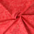 Tissu Coton imprimé Batik Calira sur fond Corail - Au mètre