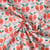 Tissu Coton imprimé Clara ruban de fête Orange sur fond Blanc cassé - Au mètre