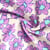 Tissu Sweat envers molletonné Cosmia fleurs Violettes sur fond Beige - Au mètre