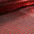 Tissu Jersey Paillettes Rouges sur fond Noir