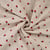 Tissu Lin Viscose Cerises brodées sur fond Beige chiné