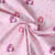 Tissu Coton imprimé  Faylina fées Roses pâle sur fond Rose poudré - Au mètre